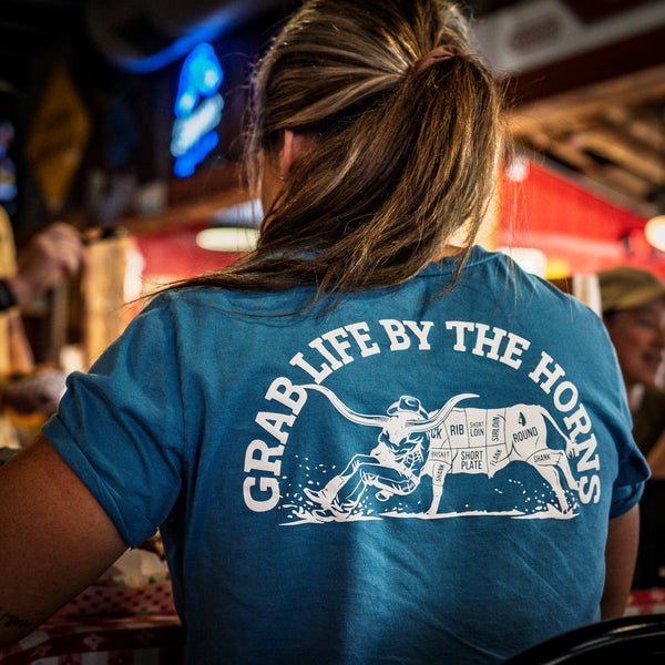 BY THE HORNS GRAPHIC TEE (WOMEN)